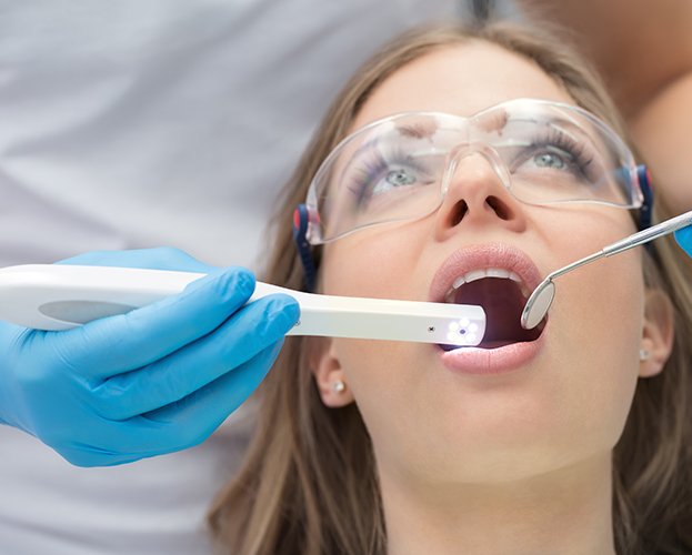 Dentist capturing intraoral images