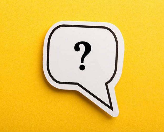 Question mark in speech bubble for questions about dental implants in Williamsville 