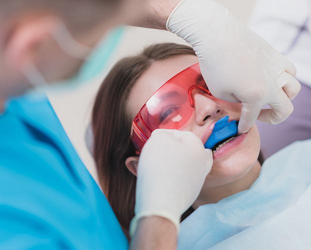 Child receiving fluoride treatment