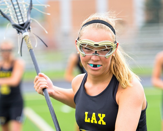 Teen girl with athletic mouthguard