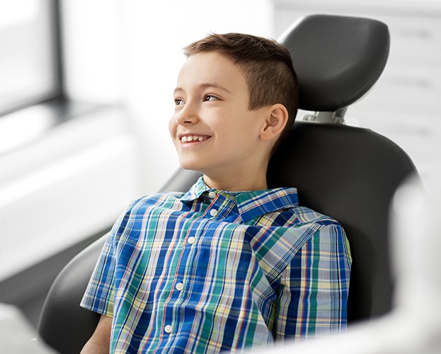 Preteen boy in dental chair