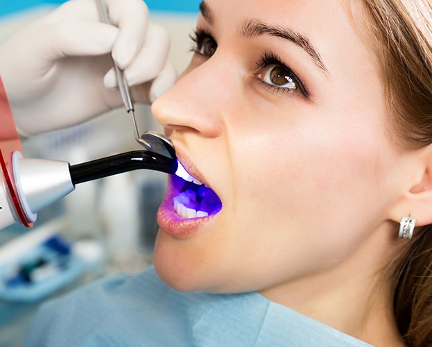 Patient receiving cosmetic dental bonding