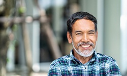 man smiling with dental implants in Williamsville