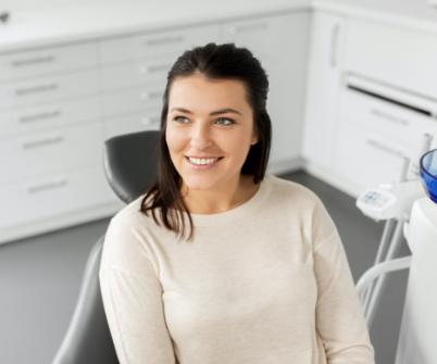 Woman smiling after preventive dentistry