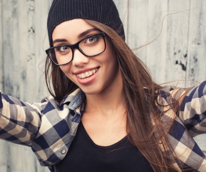 Teen girl receiving orthodontic treatment