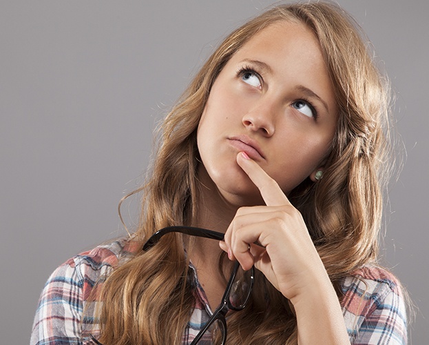 Woman considering tooth colored filling restoration