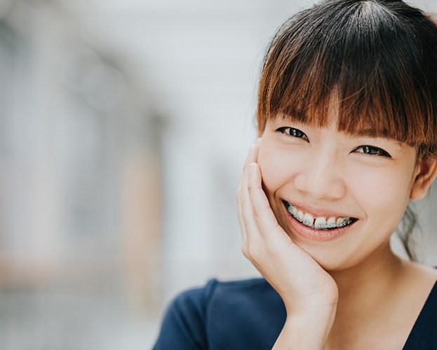 woman smiling with braces in Williamsville