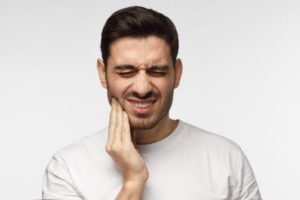 man with tooth pain