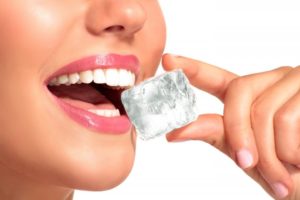 woman about to chew ice